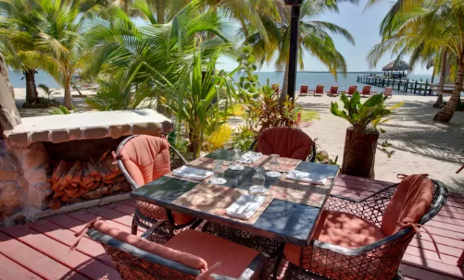 Enjoy fine dining on the patio at Singing Sands Resort