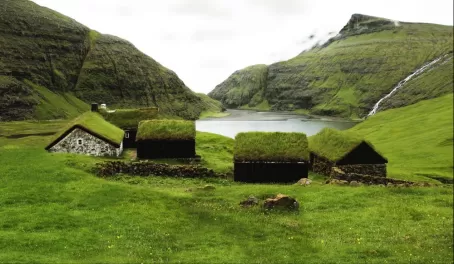 Grass covers the houses of the Faroe Islands, blending them into the landscape.