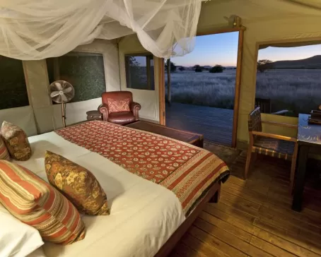 Stay in the spacious and unique rooms at the Desert Rhino Camp