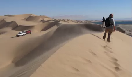 Walking across the peaks of the dunes