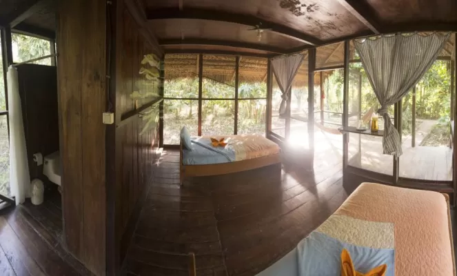 View of the full interior of Huaorani Lodge's guest cabin