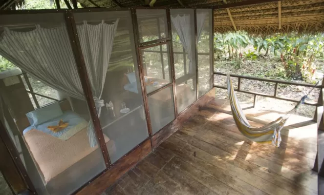 Huaorani Lodge's screened in guest cabins