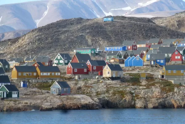 Observe the picturesque houses of Greenland
