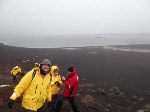 Standing on top of the volcano rim for views out of the caldera on Deception Island