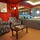 Your suite on the Caledonian Sky features three portholes