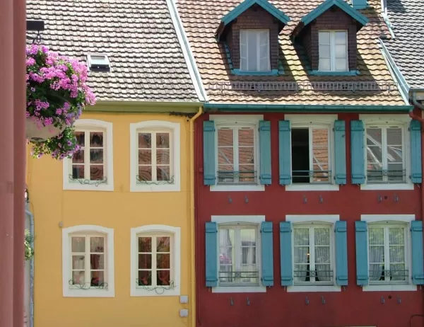 Colorful buildings line the streets of France