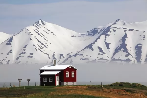 Red house on a fjord in Iceland