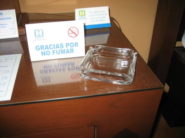 No smoking sign next to an ash tray in our hotel room