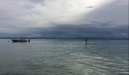 paddle boarding off the island