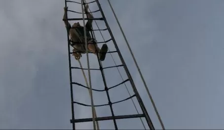 Climbing the rigging on the Liberty Clipper